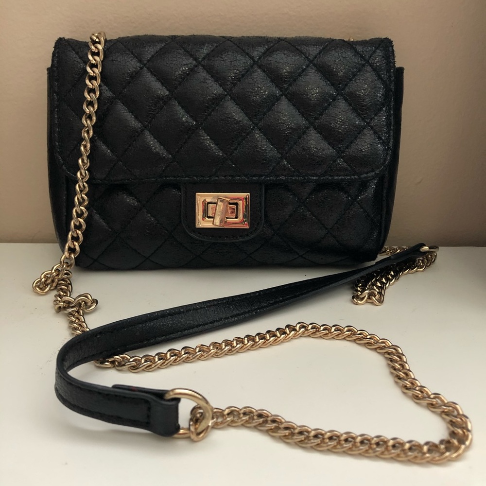 Black quilted side bag